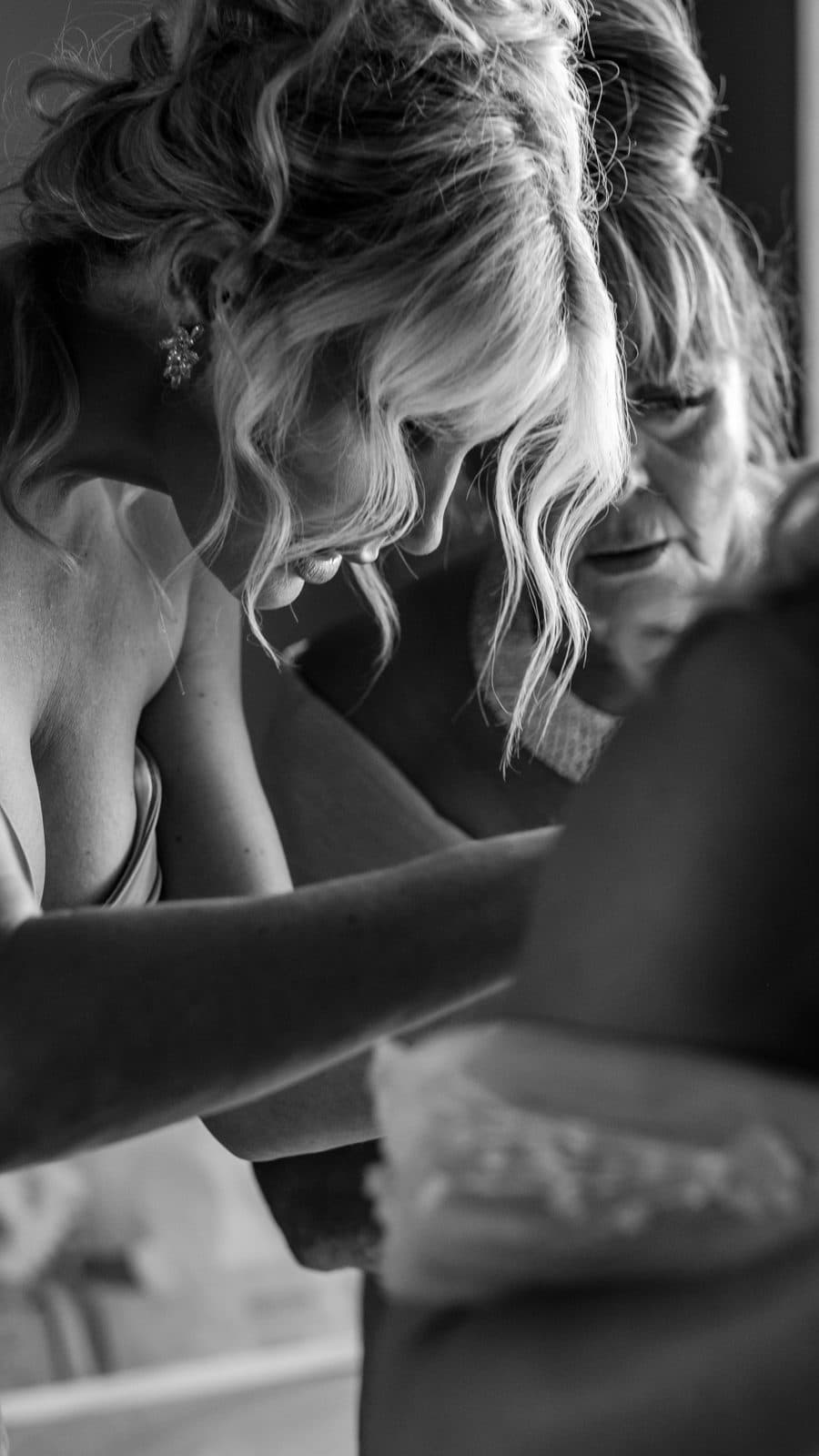 Black and white portrait of Alyssa and Chris standing close