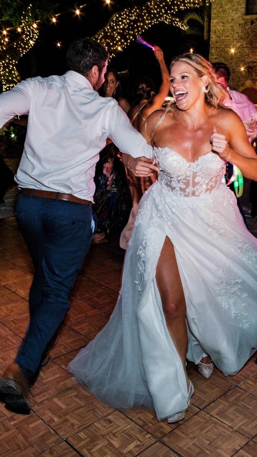 Alyssa and Chris standing together during the reception