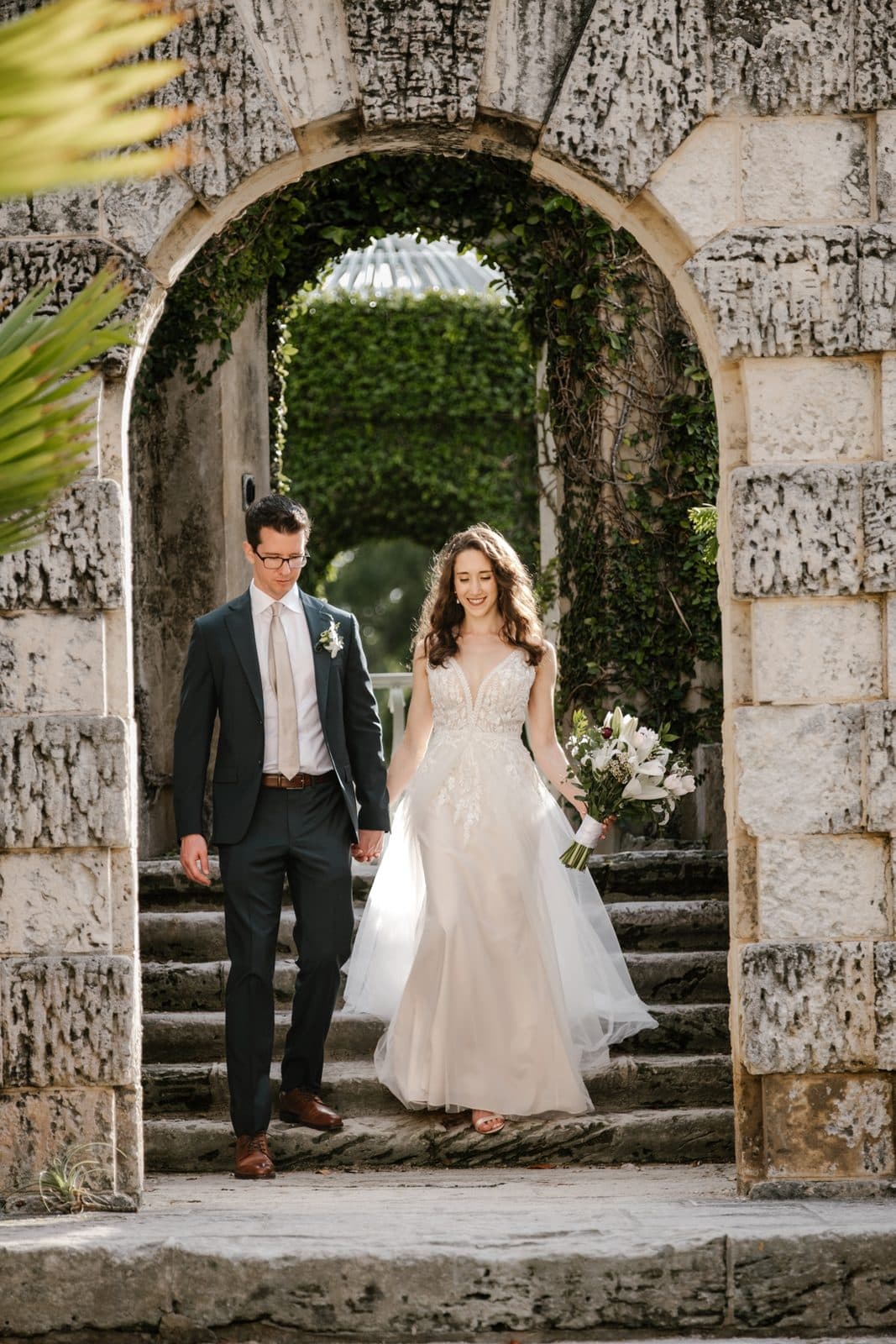 Chloe and Michael framed by a tall arch