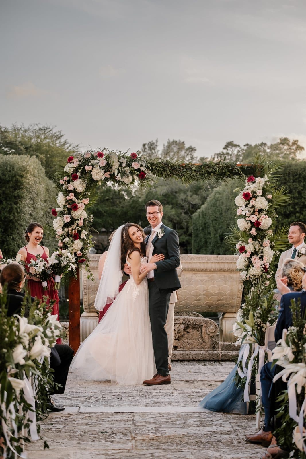 Chloe and Michael standing in a stone doorway