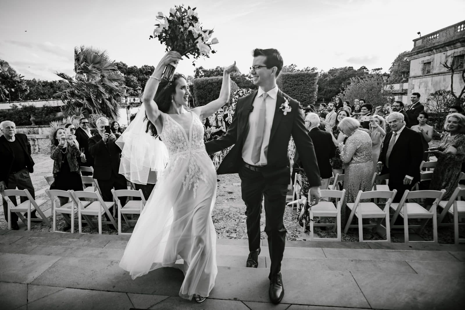 Chloe and Michael with guests gathered at Vizcaya