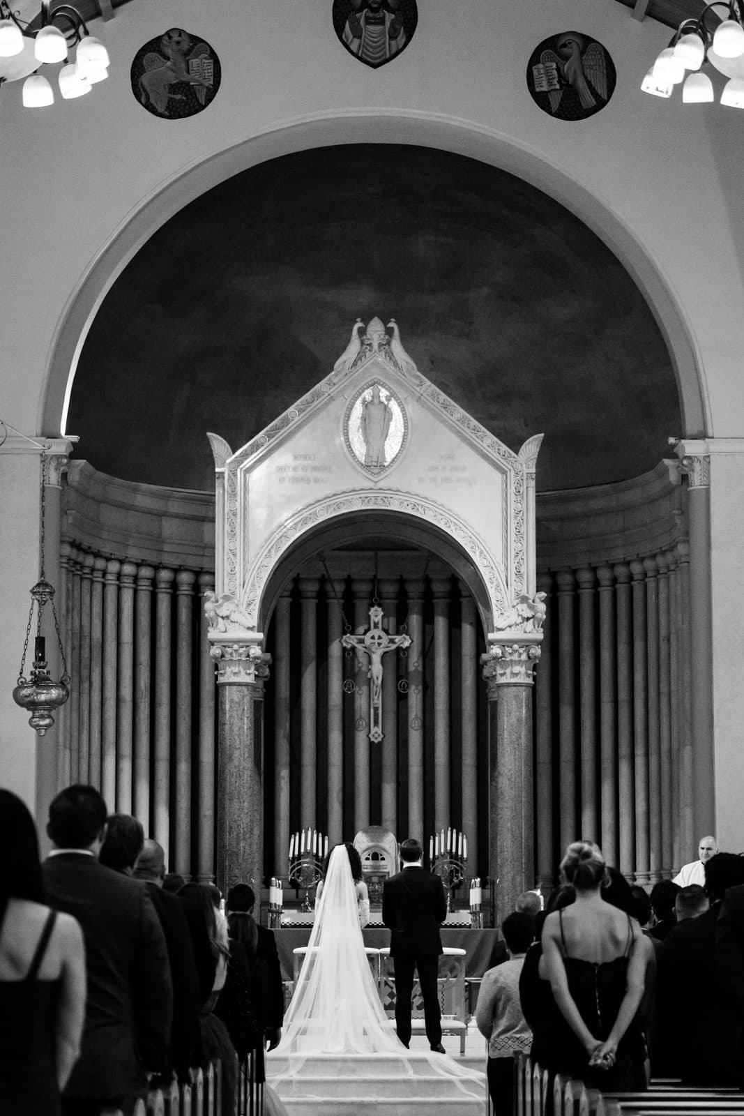 Black and white photograph of Sophia and Patrick walking together