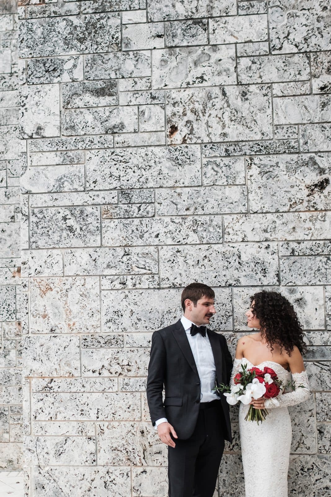 Sophia and Patrick standing together in front of the church